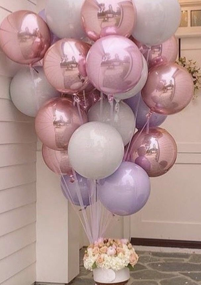 Vibrant balloon decorations in DIFC for a birthday celebration with colorful arches and helium balloons