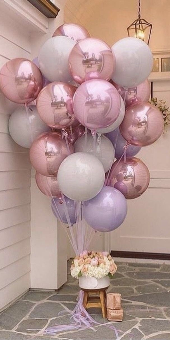Vibrant balloon decorations in DIFC for a birthday celebration with colorful arches and helium balloons