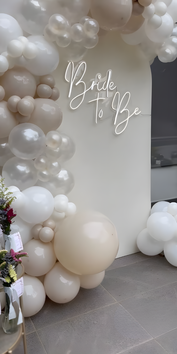 Bridal balloon arch overlooking Palm Jumeirah beach